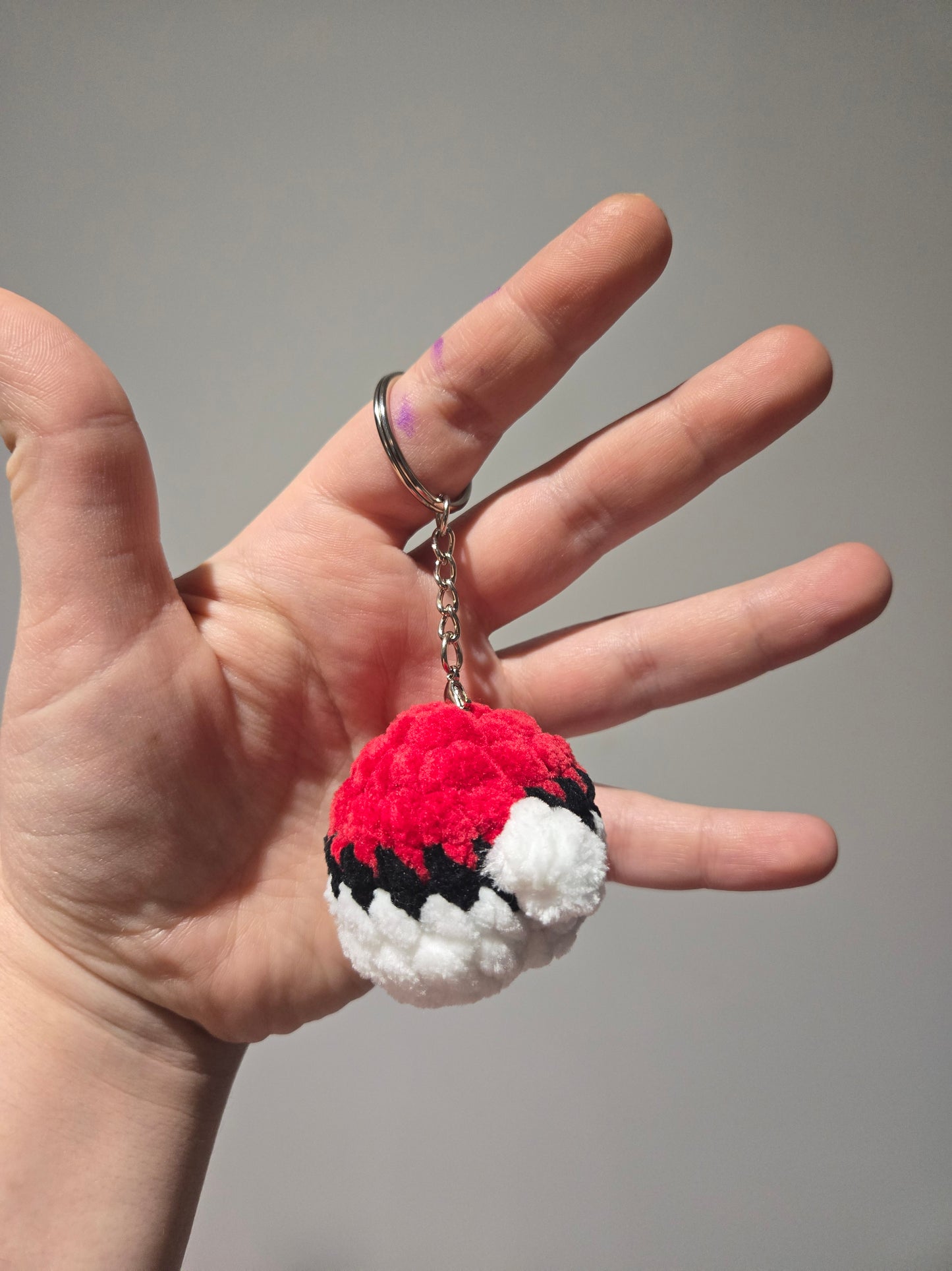 Balle attrapez les tous en tricot style porte-clé