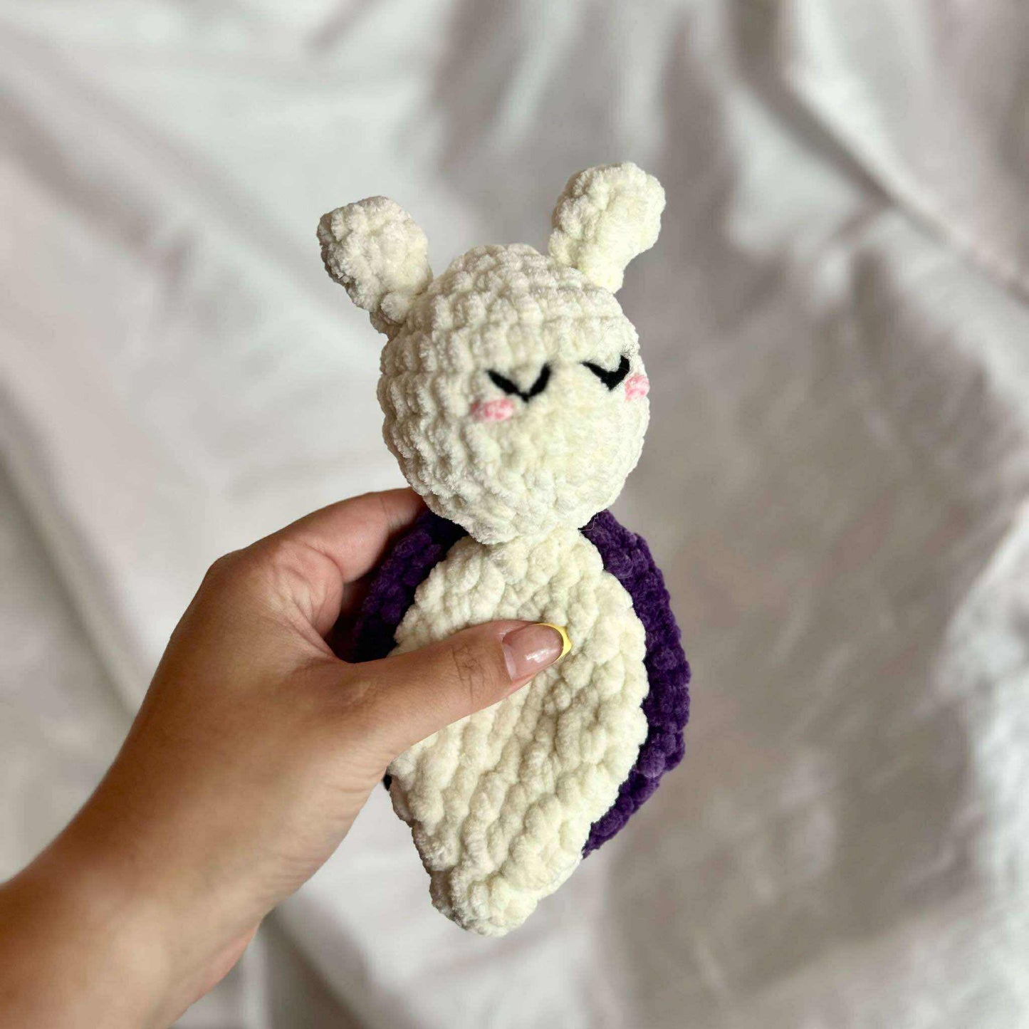 Jolie peluche en tricot
