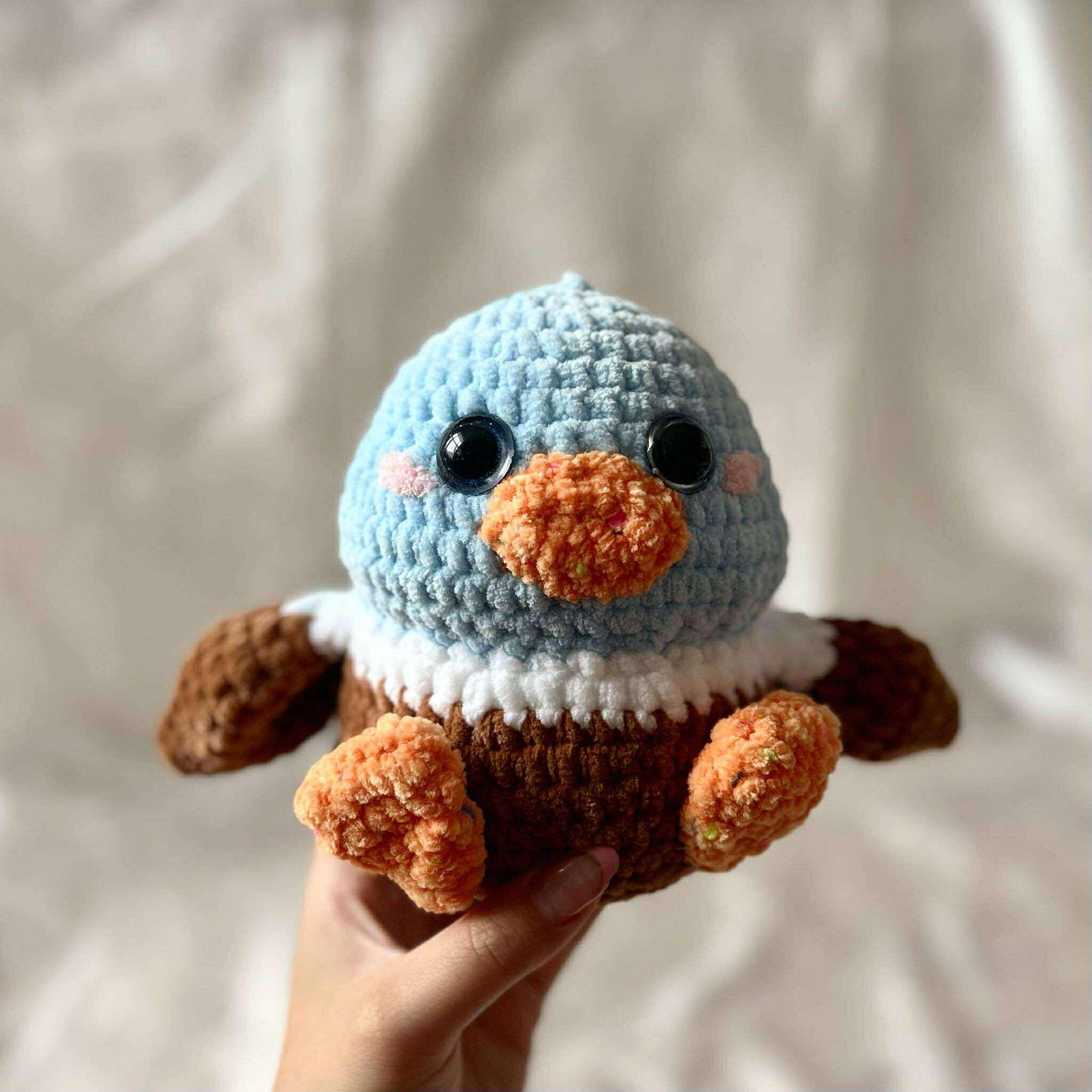 Oiseau géant en tricot