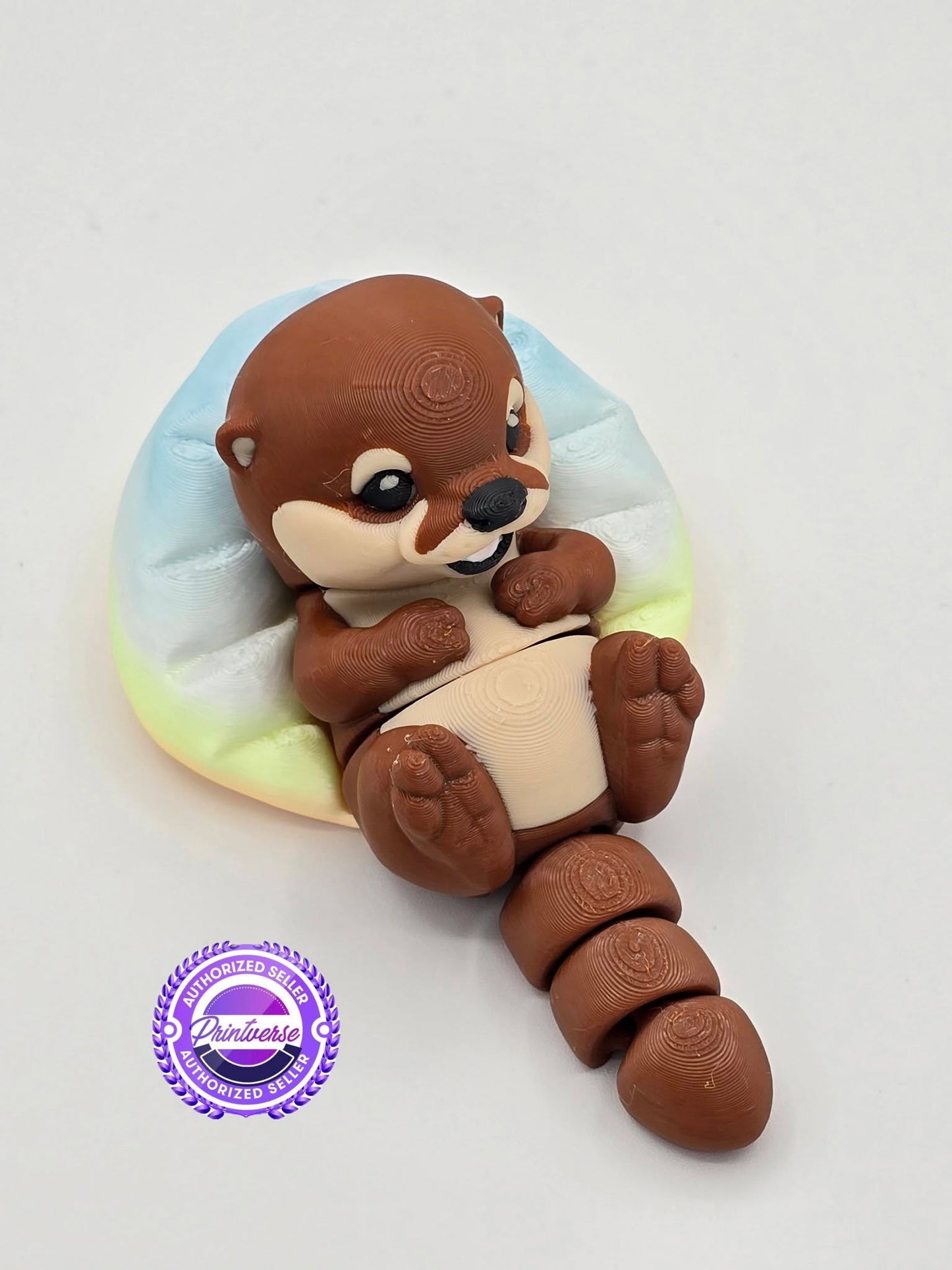 Loutre 3D sur son sofa (jouets)