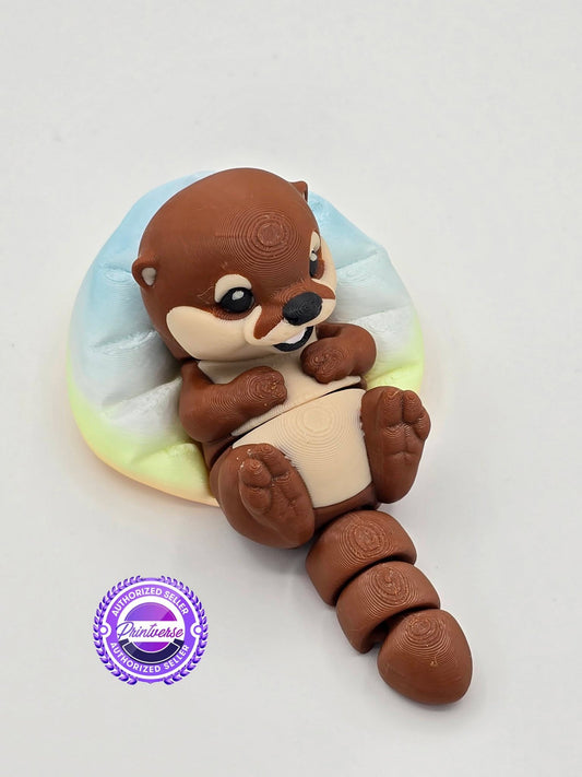 Loutre 3D sur son sofa (jouets)